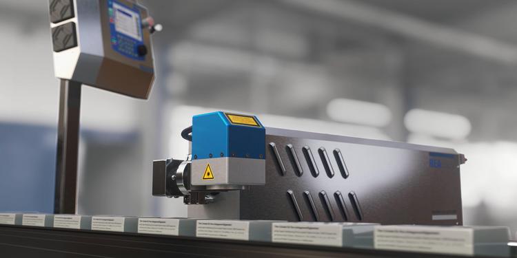 REA JET Laser CL mit Schachteln auf einem Fließband