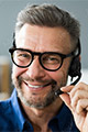 Servicemitarbeiter freundlicher Servicemitarbeiter mit Headset